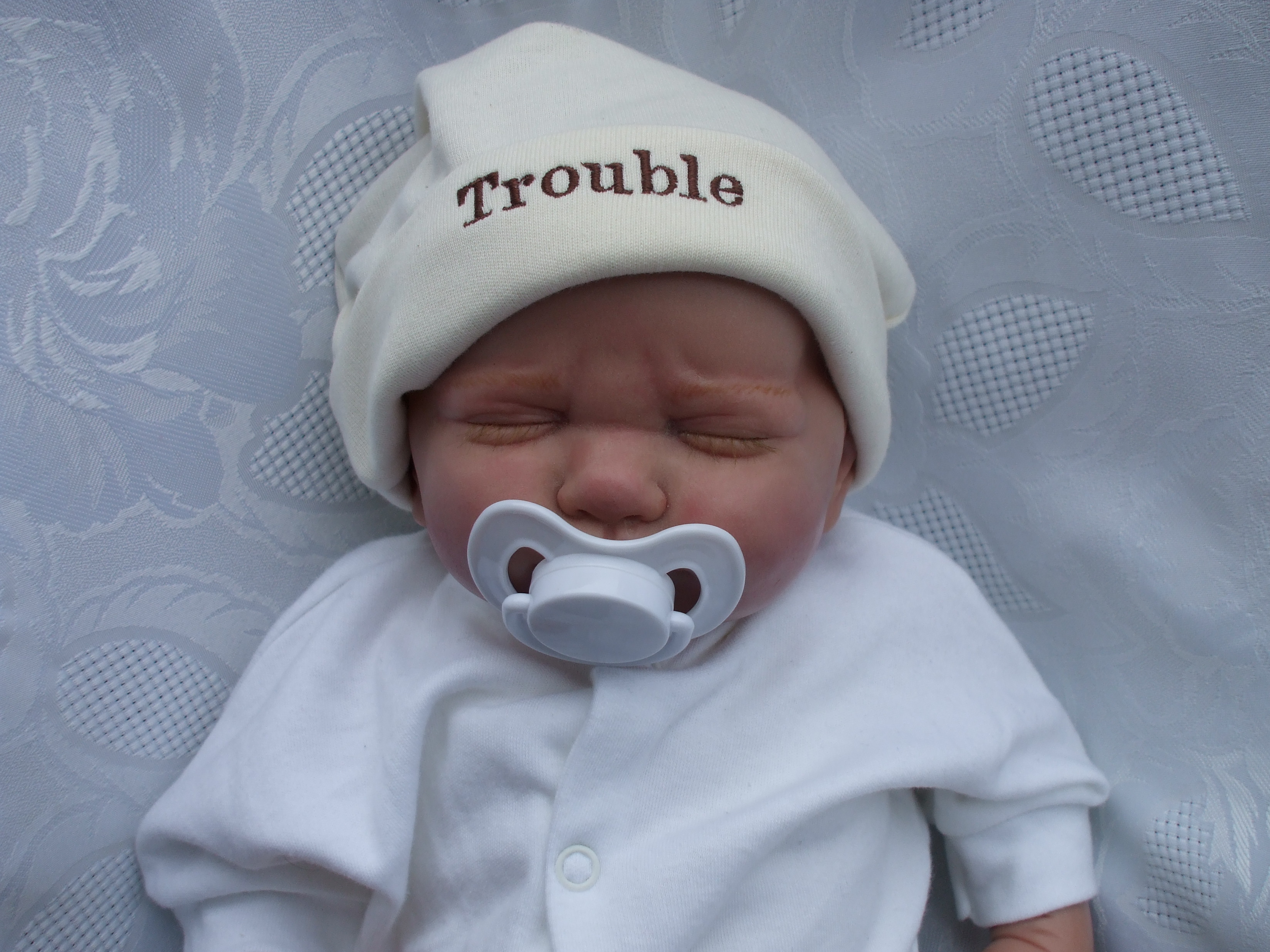 Newborn Slogan Hat TROUBLE